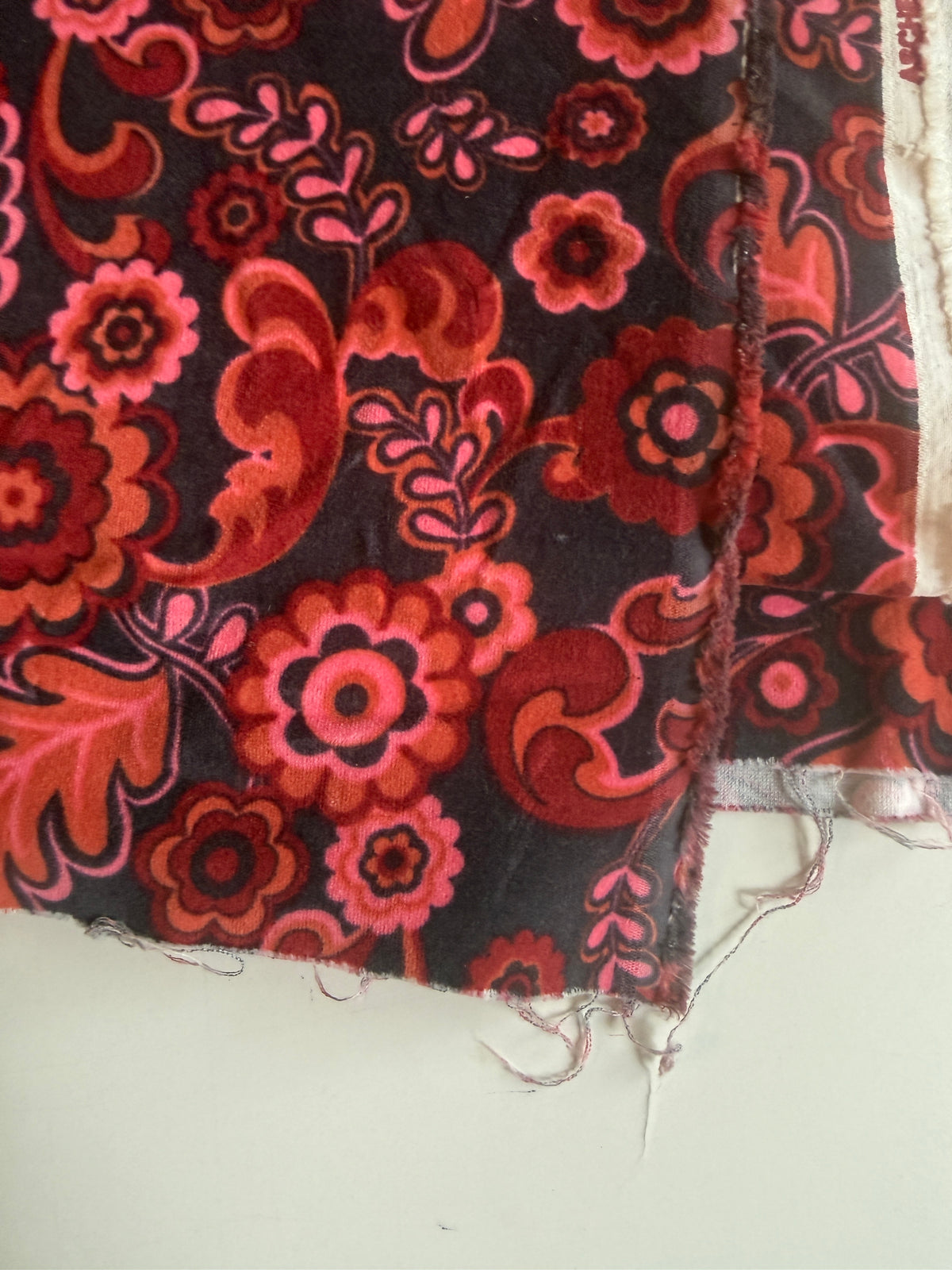 Retro floral pink acid paisley on crushed velvet