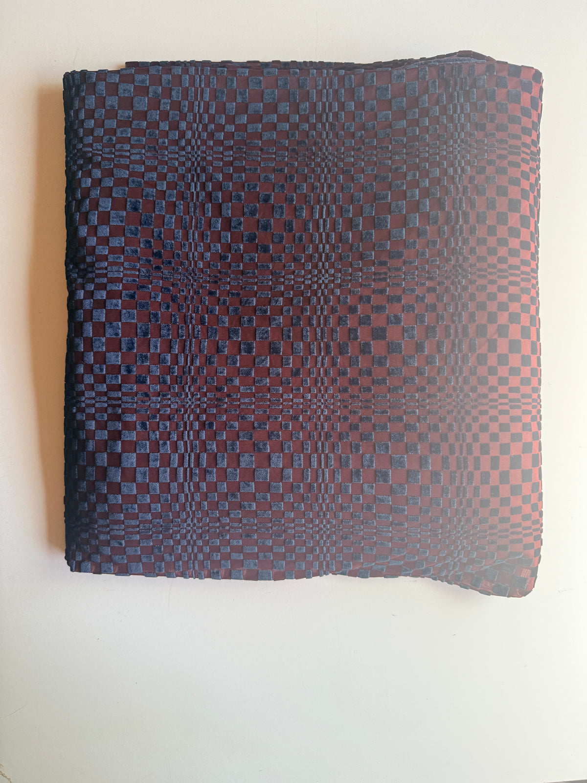Geometric Velvet shapes on burgundy mesh