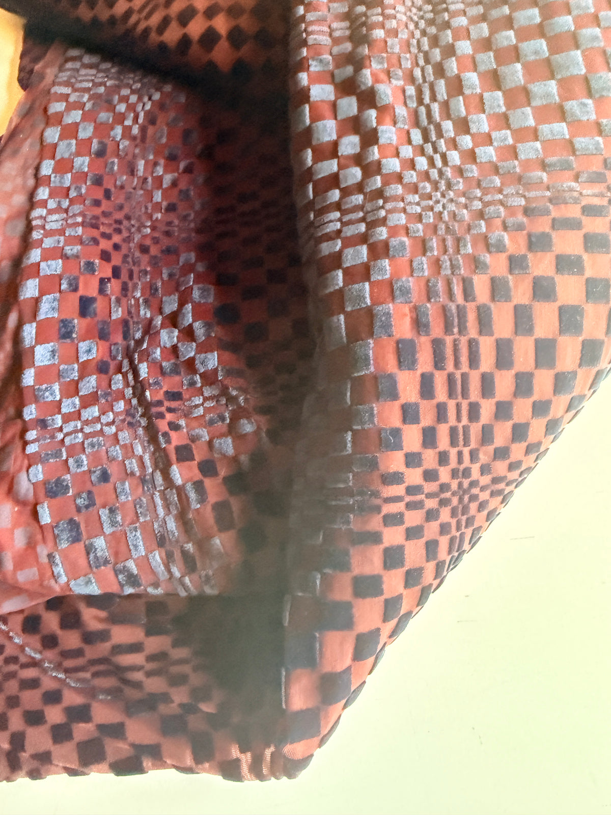 Geometric Velvet shapes on burgundy mesh