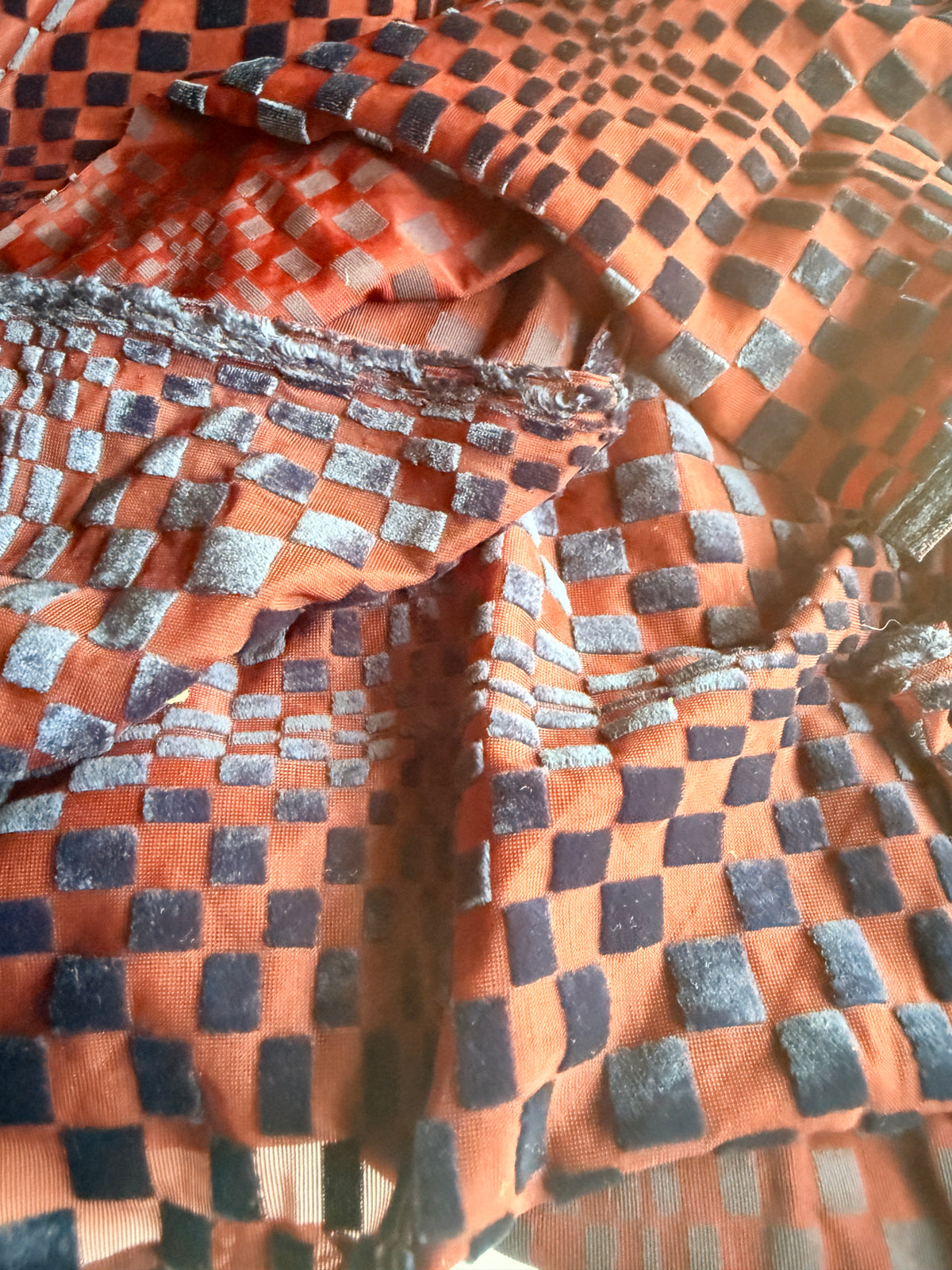 Geometric Velvet shapes on burgundy mesh