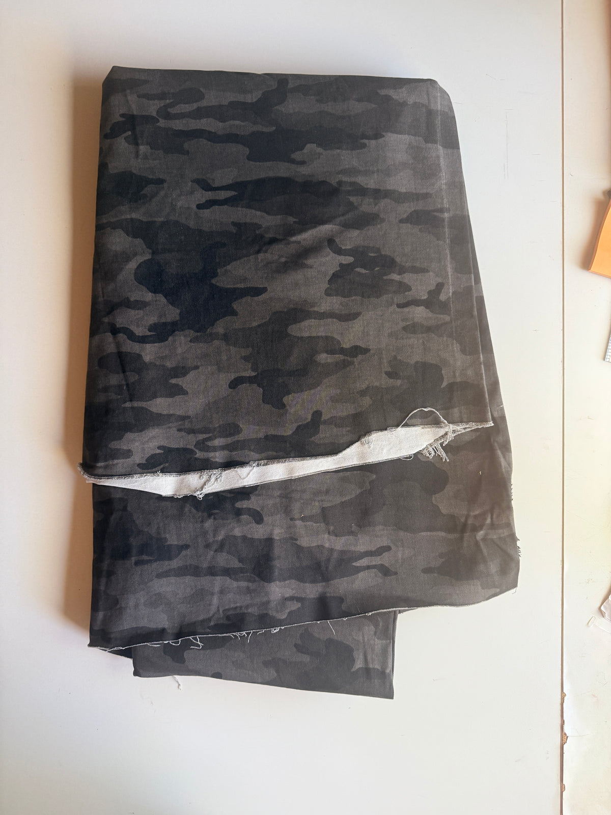 Dark grey camouflage print with 2-way stretch