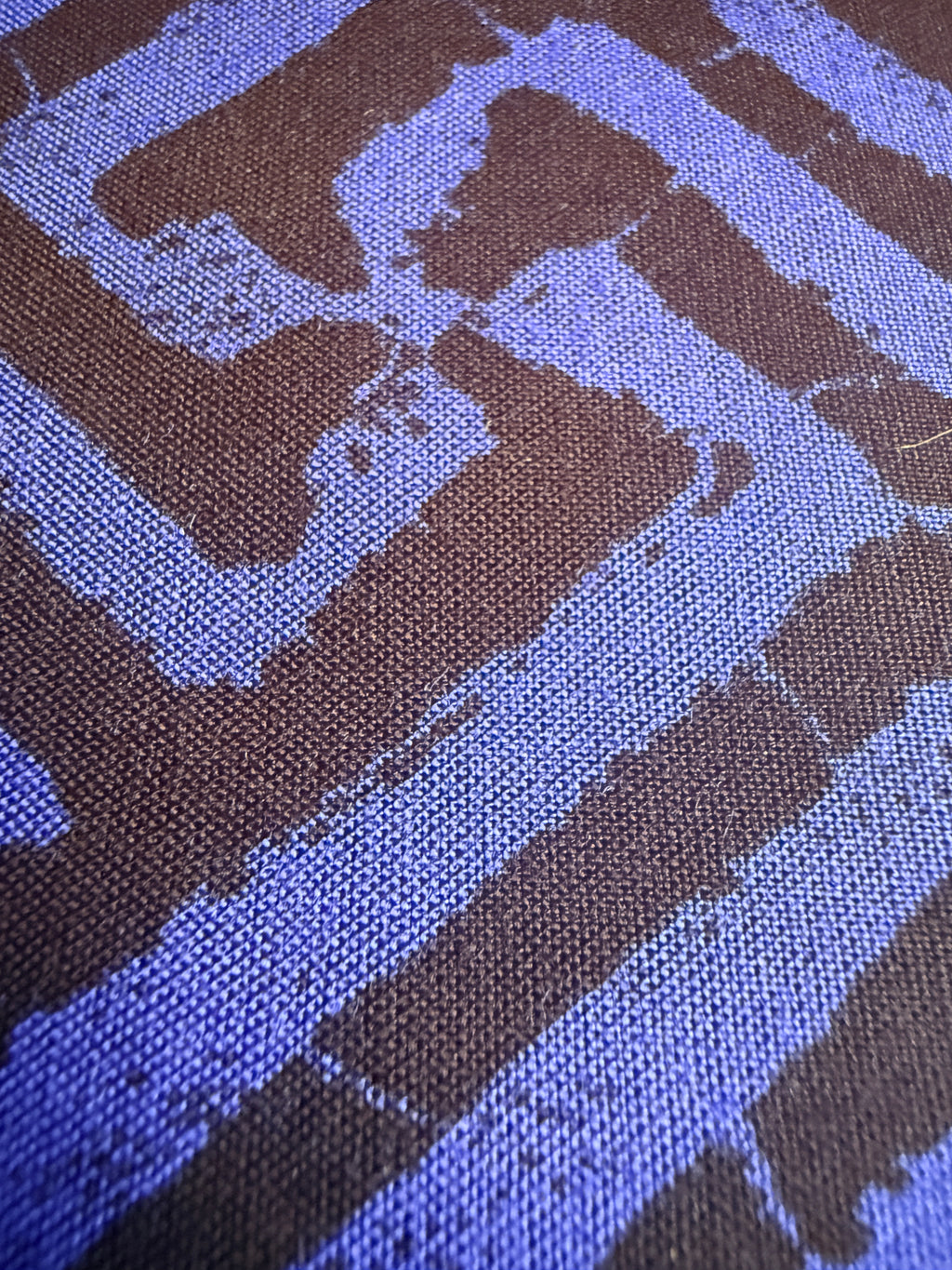 Black and blue geometric intricate maze-like motif